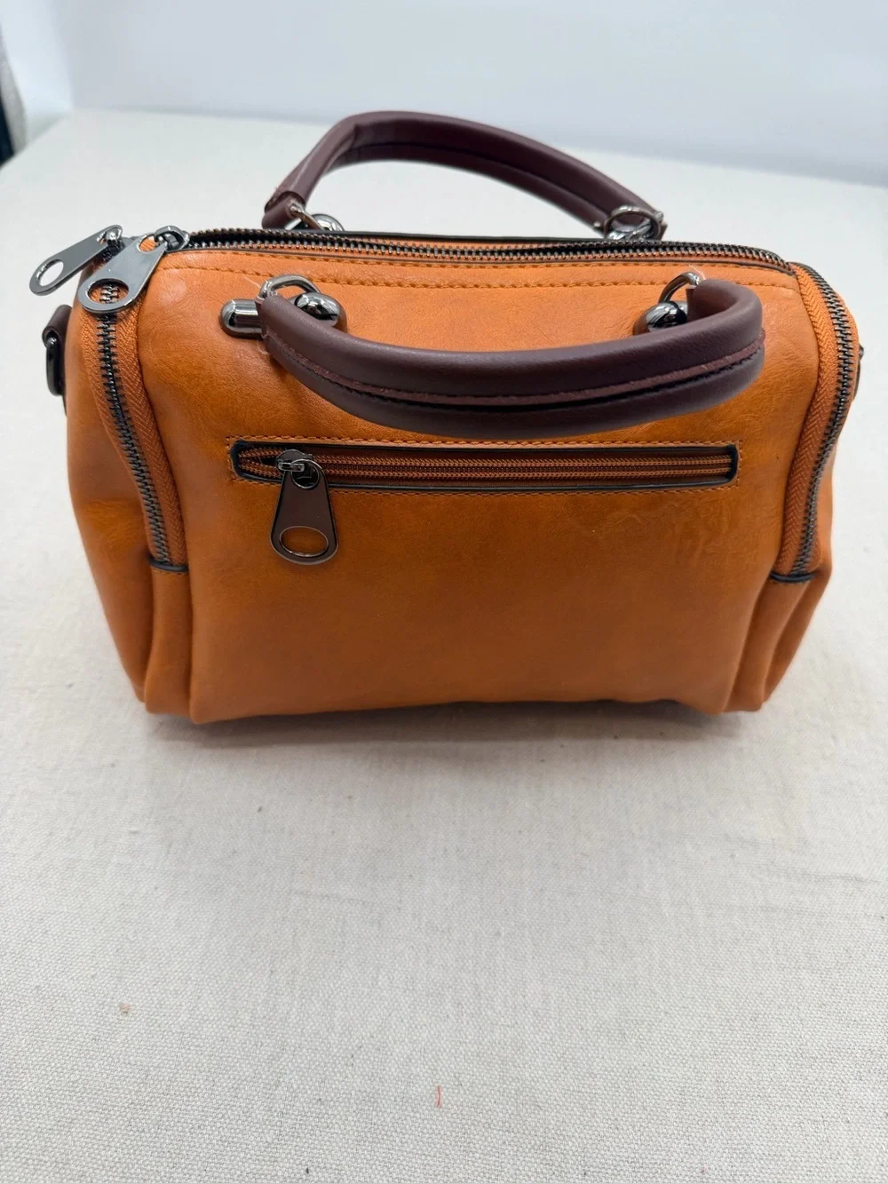 Structured Orange Satchel with Tassel Accent